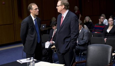 
              Mark Zandi, chief economist at Moodys Analytics, left, speaks with Kevin Hassett, senior fellow and director of Economic Policy at the American Enterprise Institute (AEI), on Capitol Hi